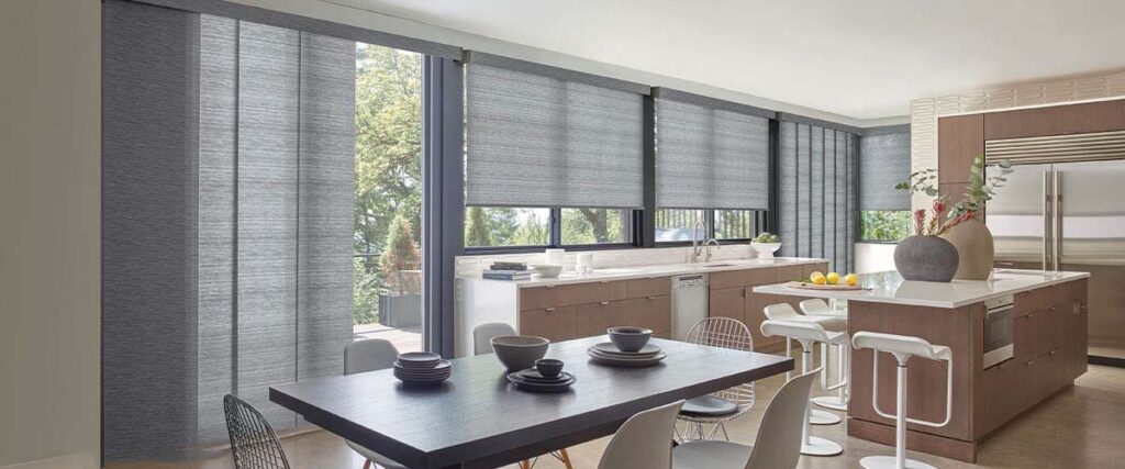 Designer Solar Shades and Skyline Panel Track Blinds in the Kitchen